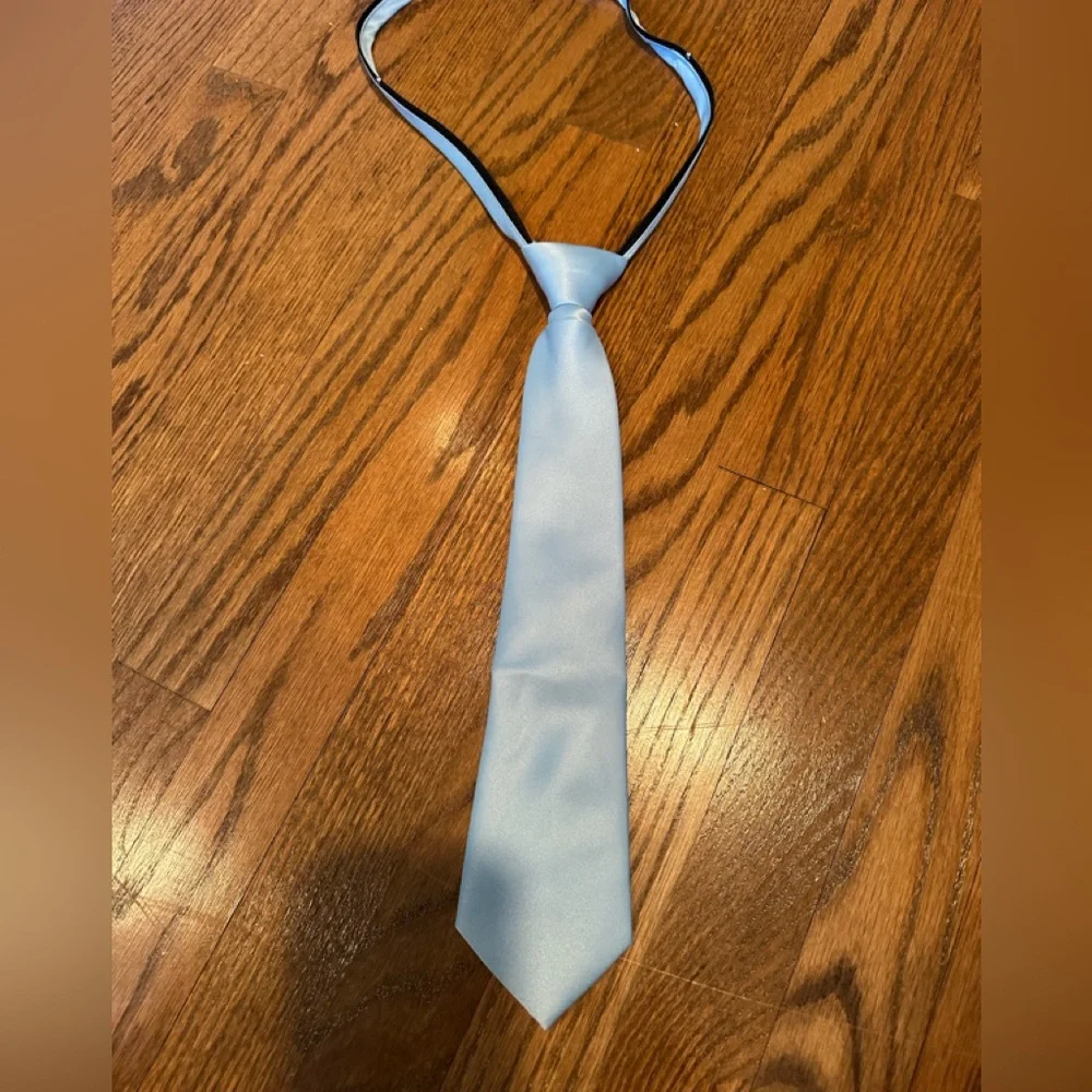 Brand new never worn boys light blue neck tie